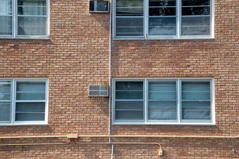 Modern aluminium-framed windows on an apartment façade