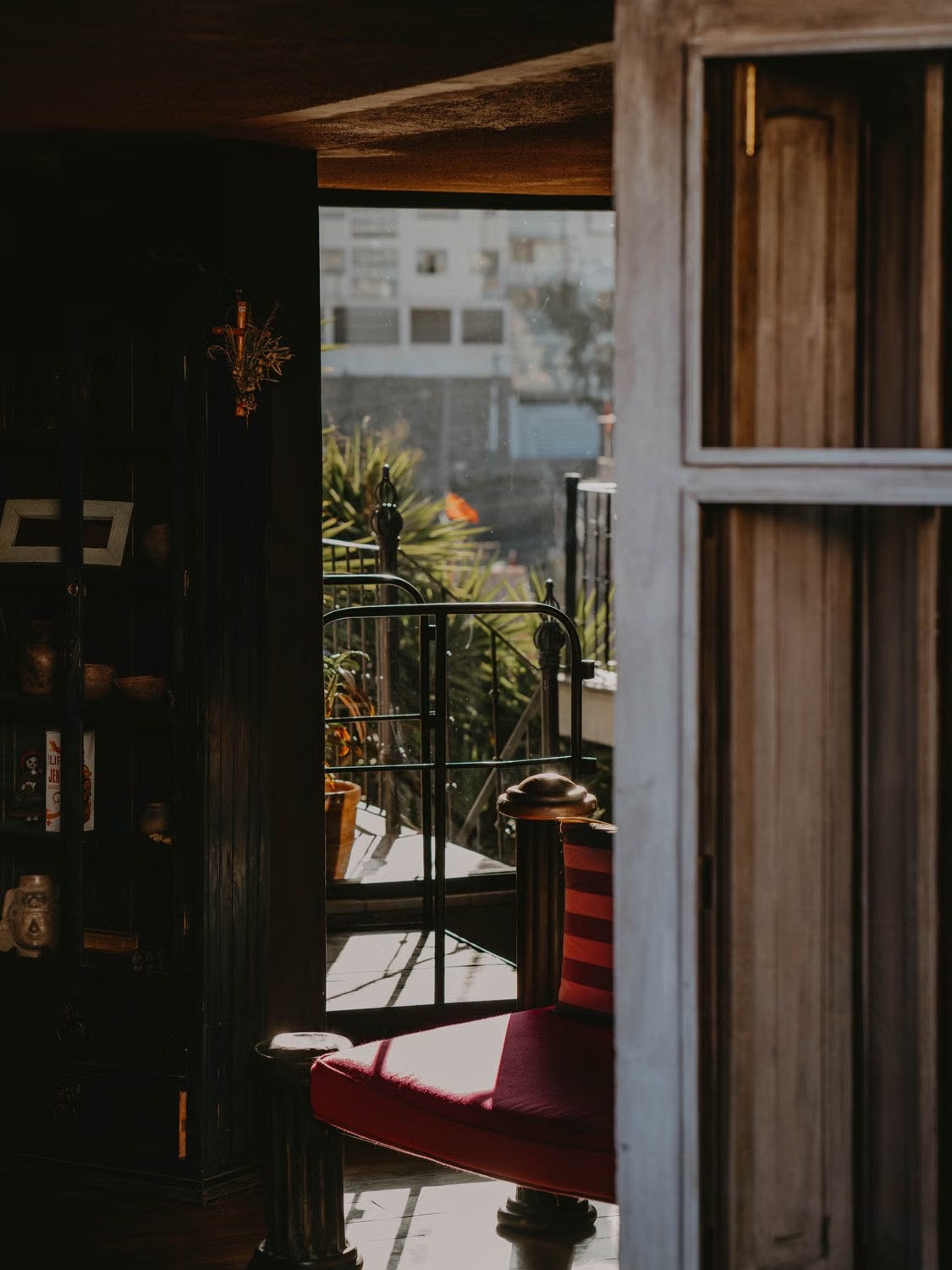 Sunlit home interior beside an open window
