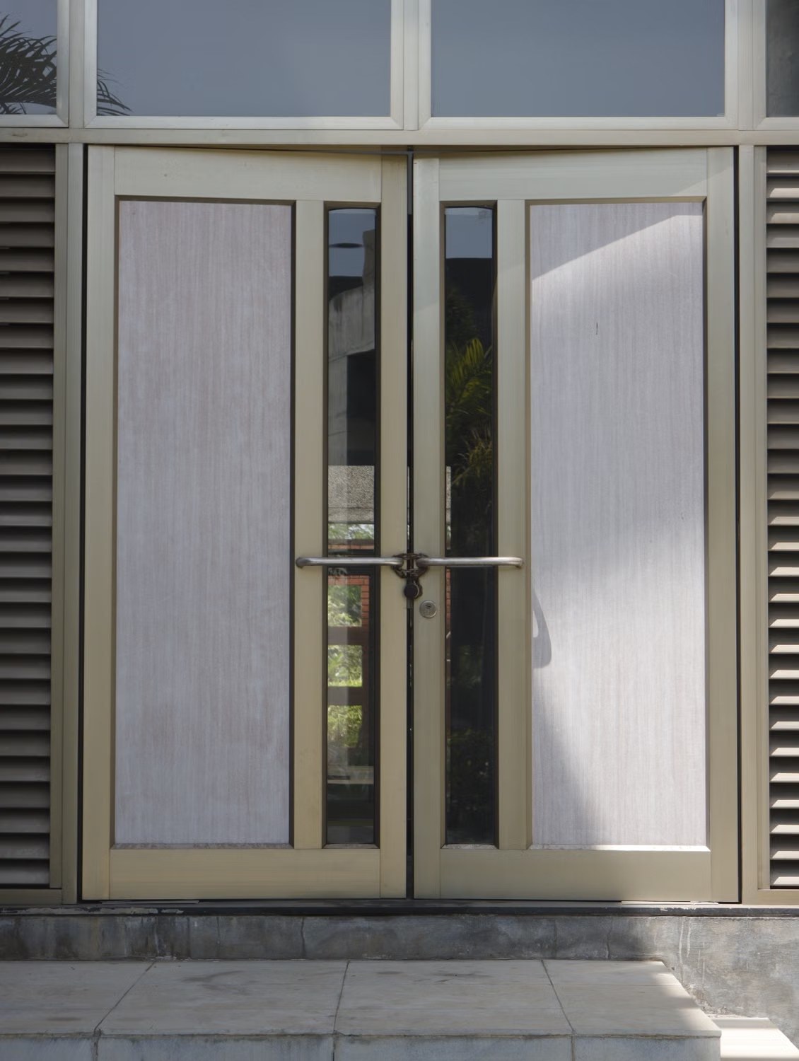Contemporary glass and metal entrance doors
