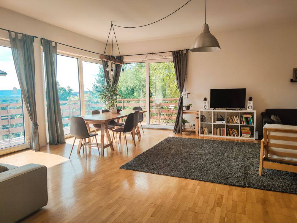Living room with glazed doors overlooking the landscape