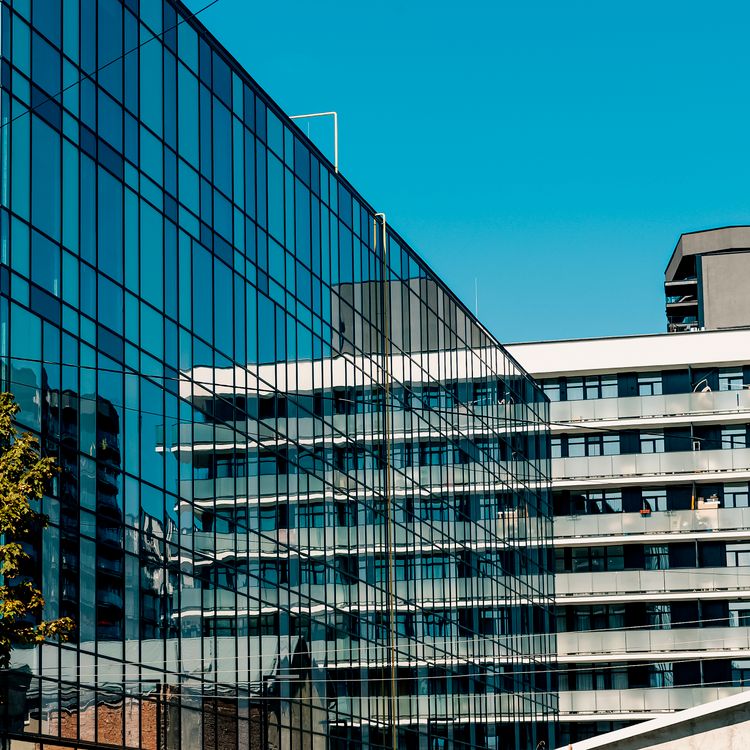 Modern urban building with a reflective glass façade