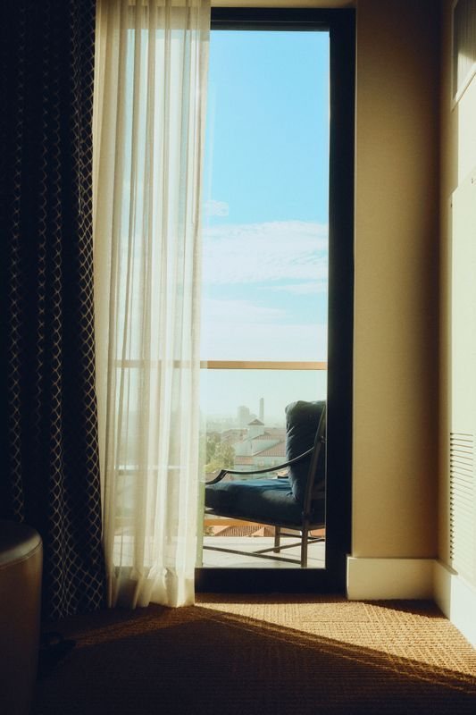 Hotel balcony glazing and curtains