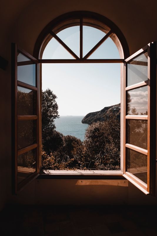 Open arched window looking toward the sea