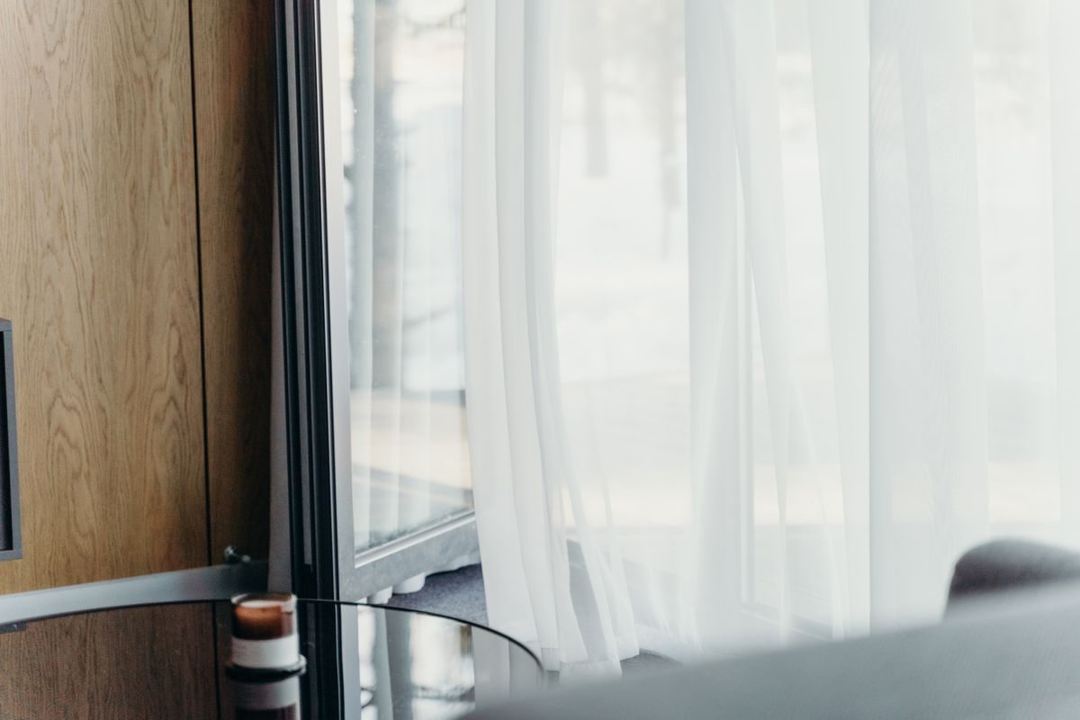 Curtain beside a hotel-room window