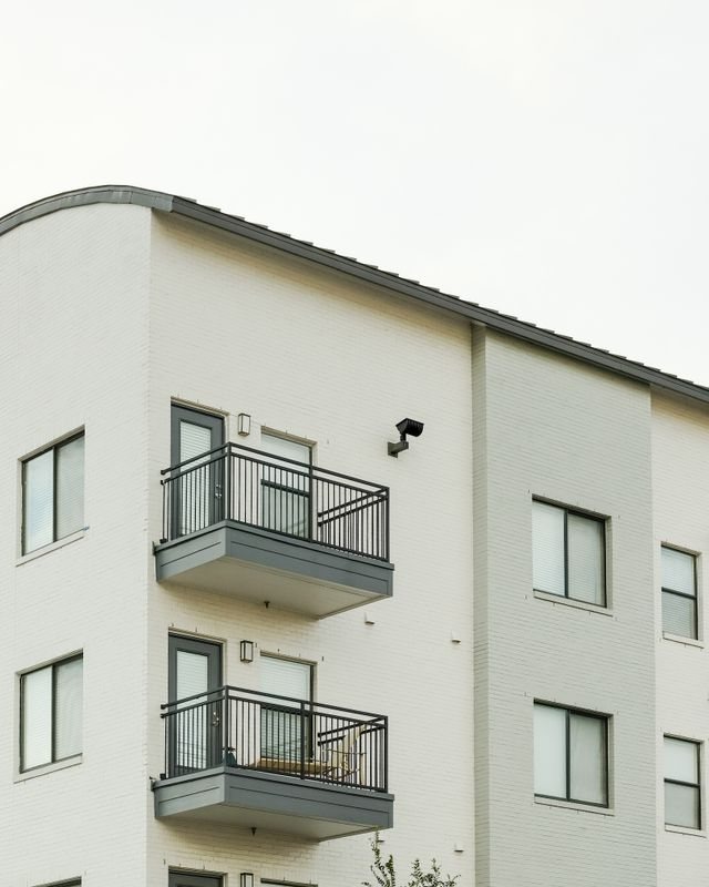 Contemporary apartment balconies with wide windows