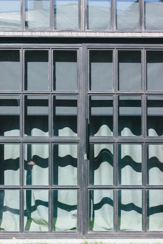 Detailed facade of repeating glass panels