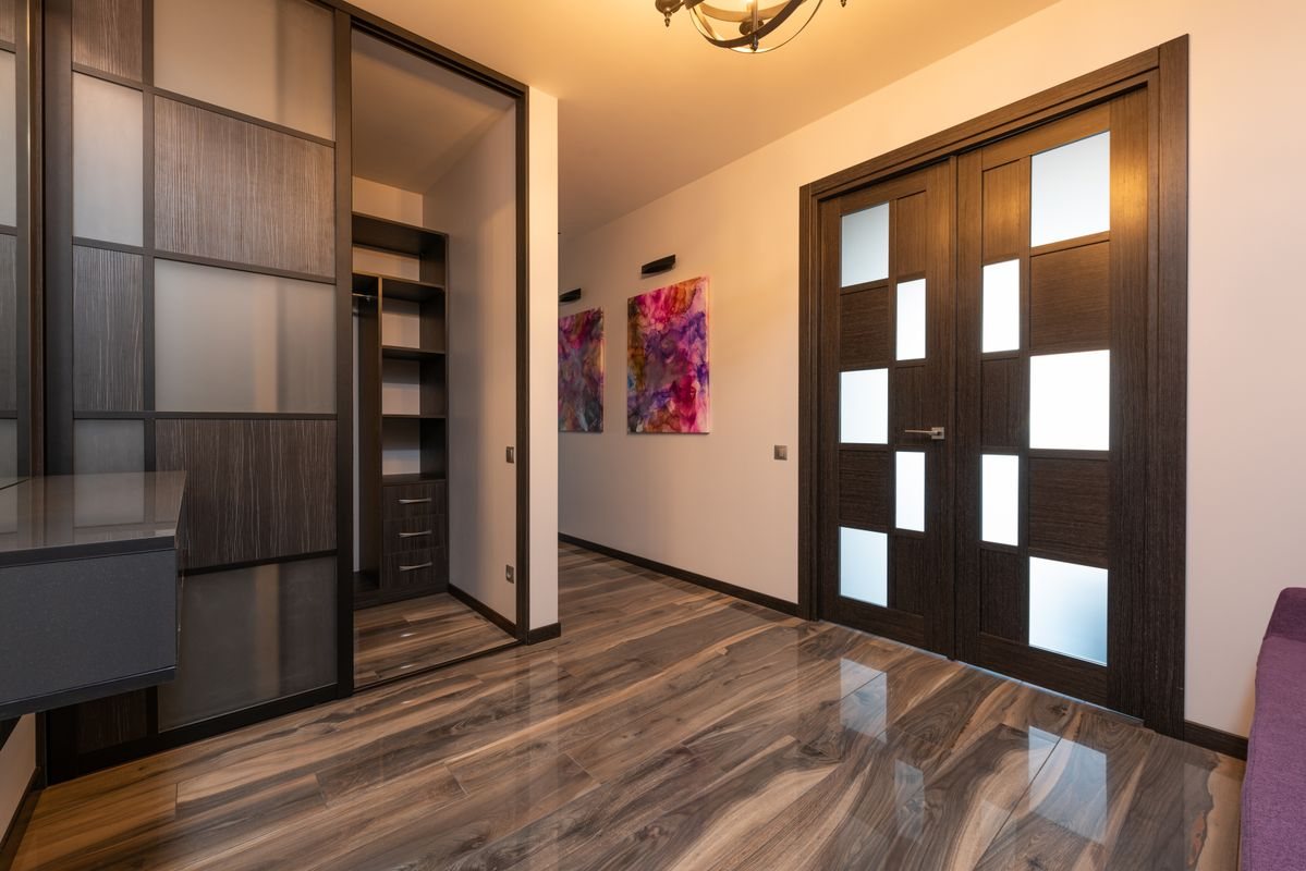 Modern interior with a full-height sliding door panel