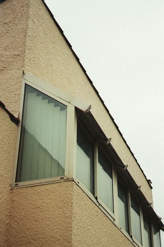 Corner of a building with modern glazed windows