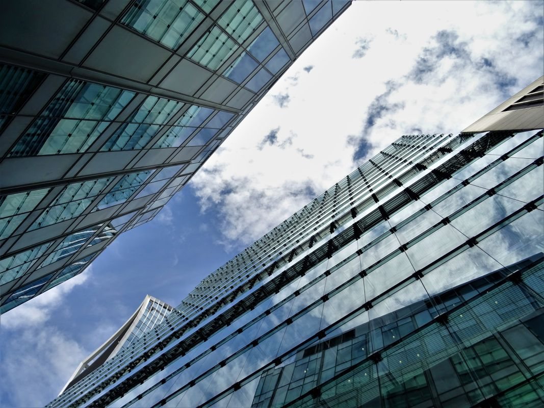 High-rise glass facades viewed from street level
